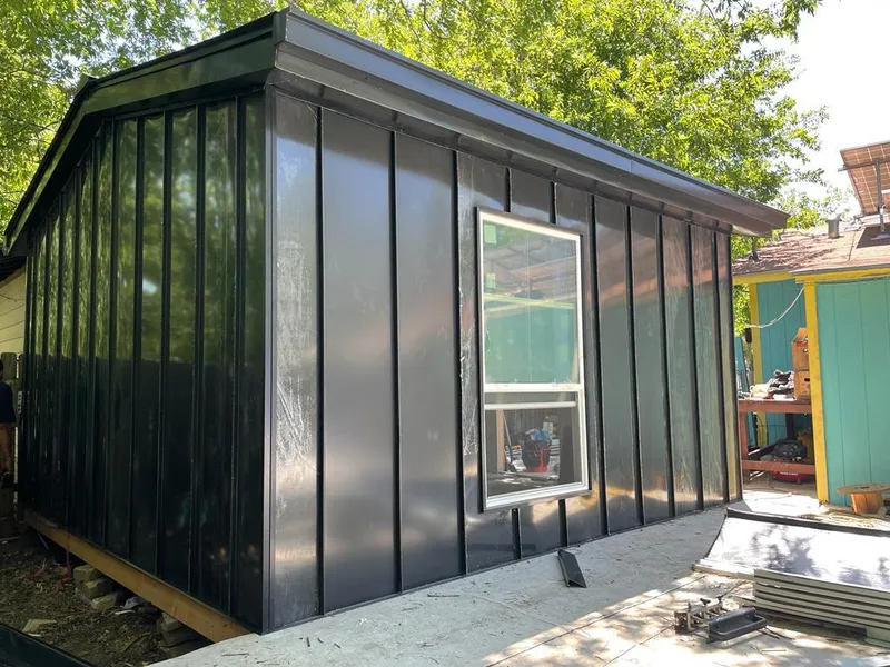 Black standing seam metal wall panels for Metal Roof Installation in Chelmsford